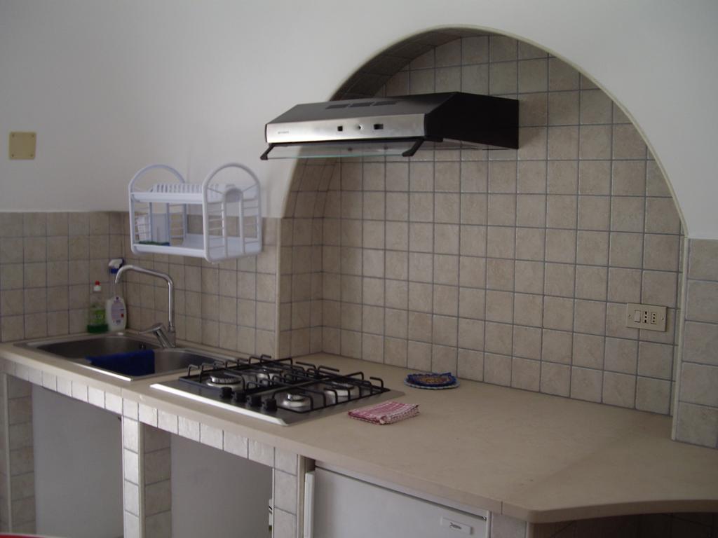 لوكوروتوندو Trulli Convertini الغرفة الصورة