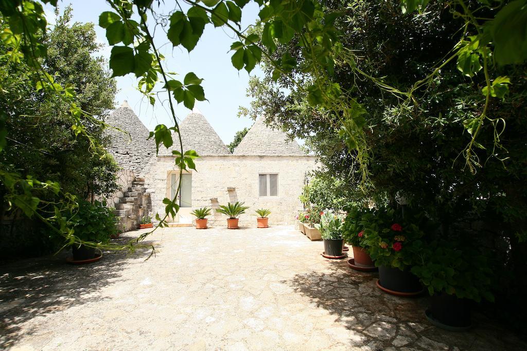 لوكوروتوندو Trulli Convertini الغرفة الصورة