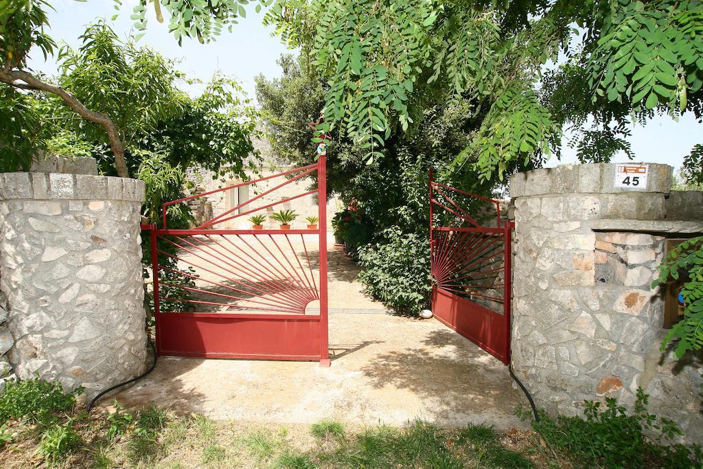 لوكوروتوندو Trulli Convertini الغرفة الصورة
