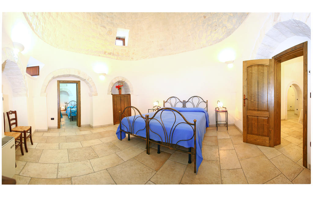 لوكوروتوندو Trulli Convertini الغرفة الصورة