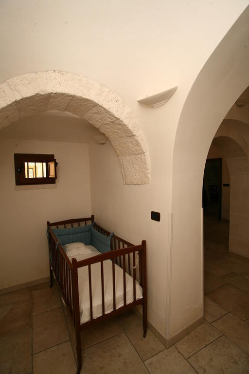 لوكوروتوندو Trulli Convertini الغرفة الصورة