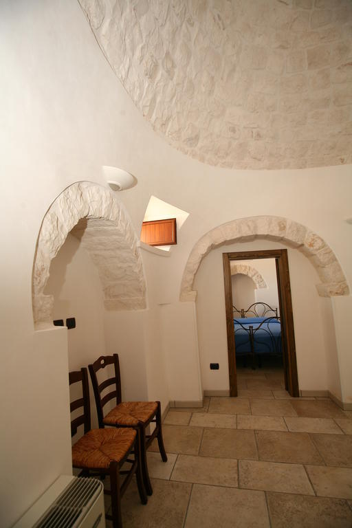 لوكوروتوندو Trulli Convertini الغرفة الصورة